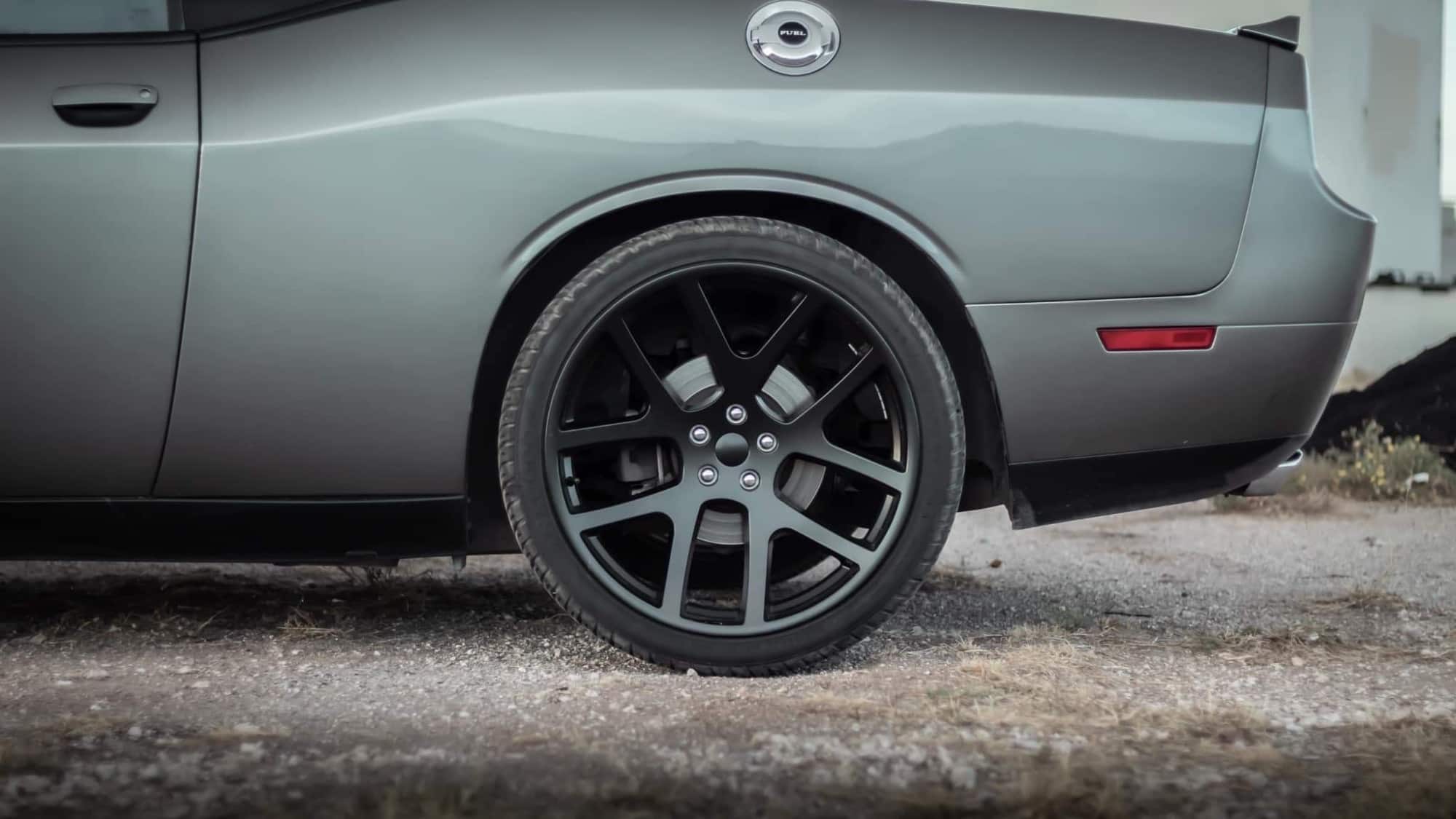 A close up on the Factory Reproductions Fr64 22x10 +18 on this Challenger R/T