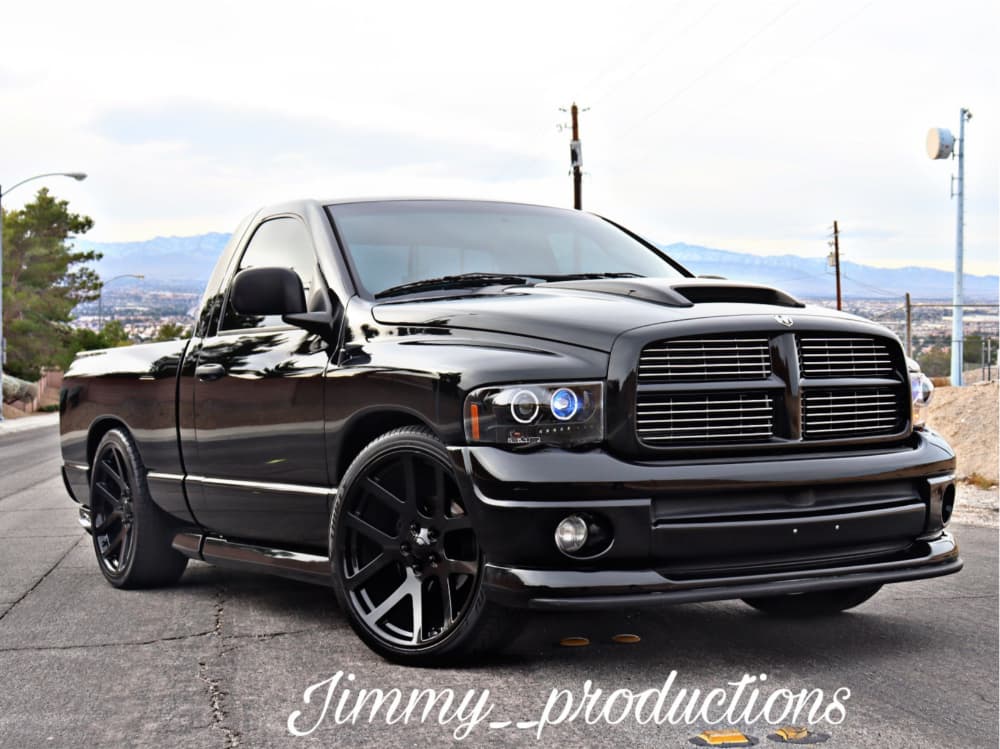A lowered, grey 2004 Dodge Ram 1500 with Factory Reproductions Fr60 24x10 +25 and Lionhart Lh-503 305/30 riding on Neuspeed Race springs Lowered 4F / 6R