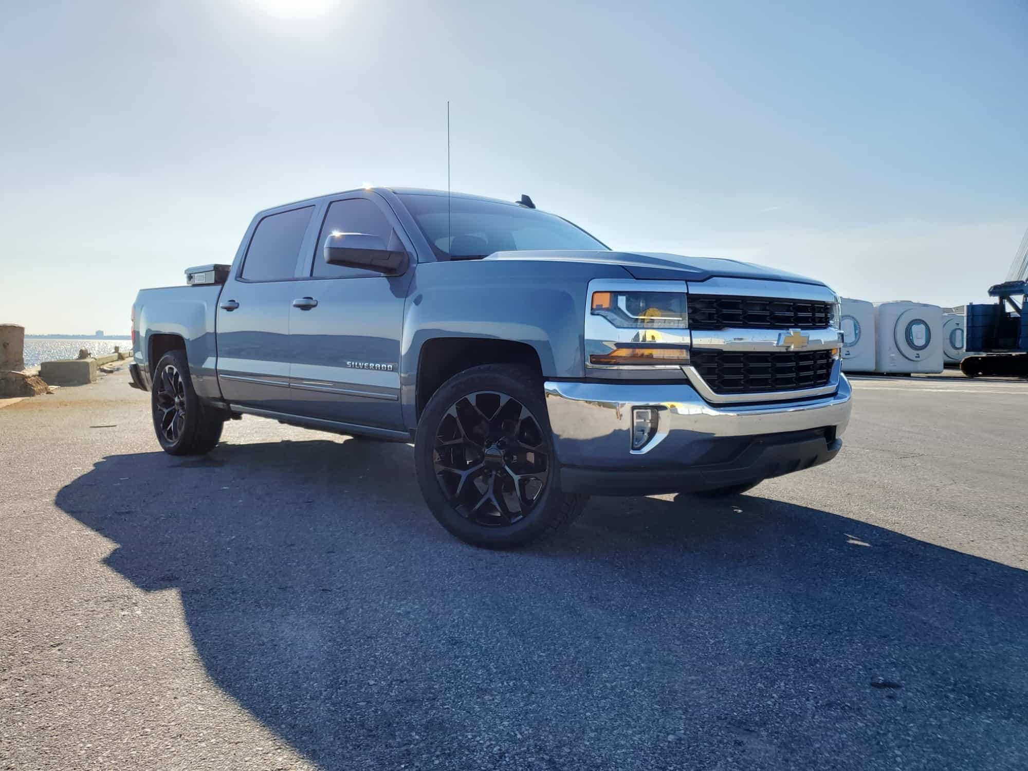 A 2016 Chevrolet Silverado 1500 with the Factory Reproductions Fr59 22x9 +31 wrapped in some Toyo Tires Proxes St Iii 305/45 and riding on Stock Suspension