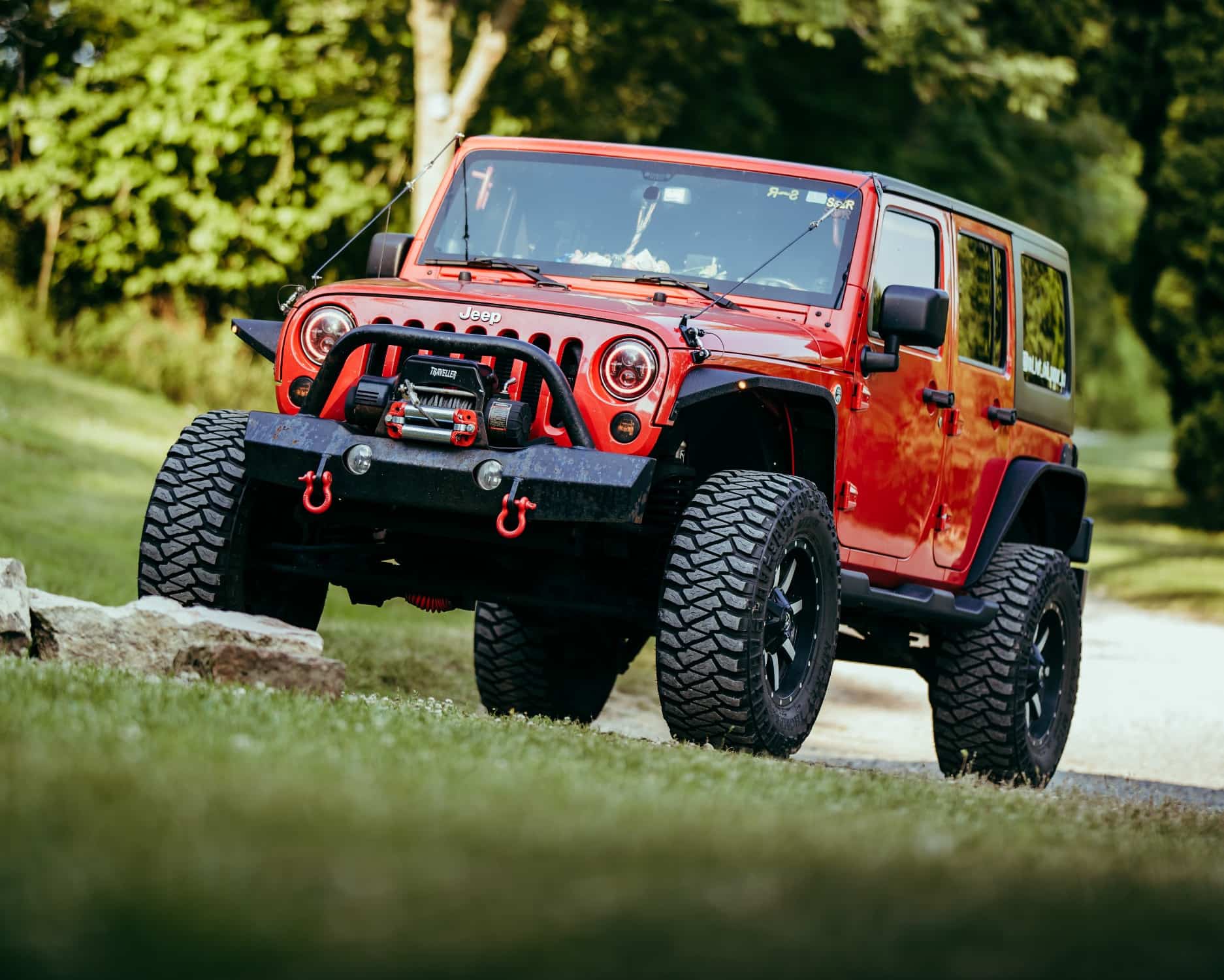 Red Jeep Wrangler JK running the Fuel Maverick