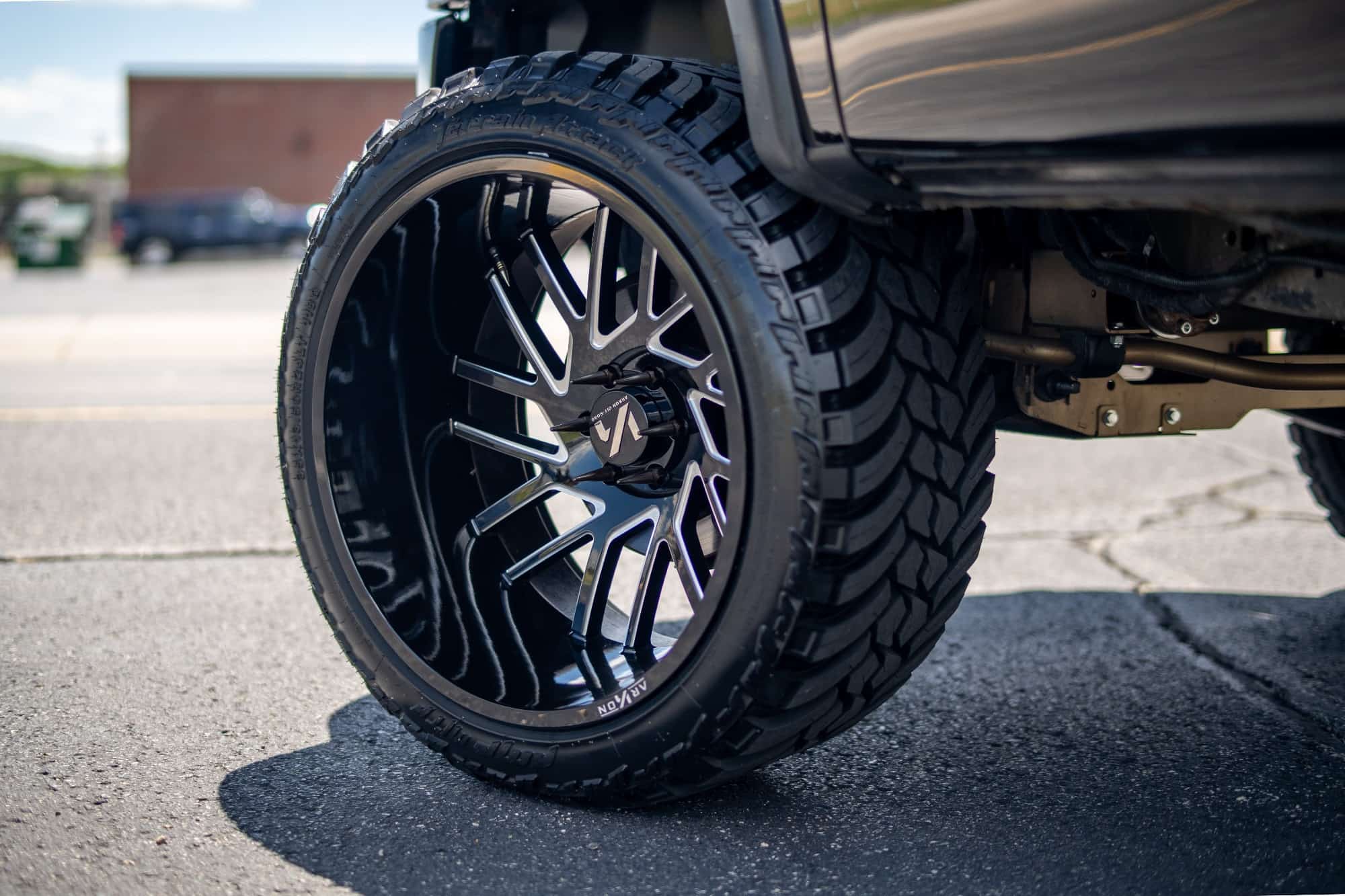 A Black lifted Ford F-150 with the ARKON Mandela